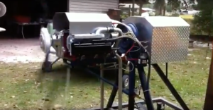 The spyder engine and a walk around while it is running on an engine stand.